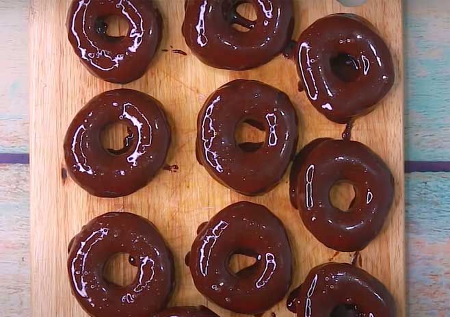 Dip both Sides Of The Donut Into The Chocolate