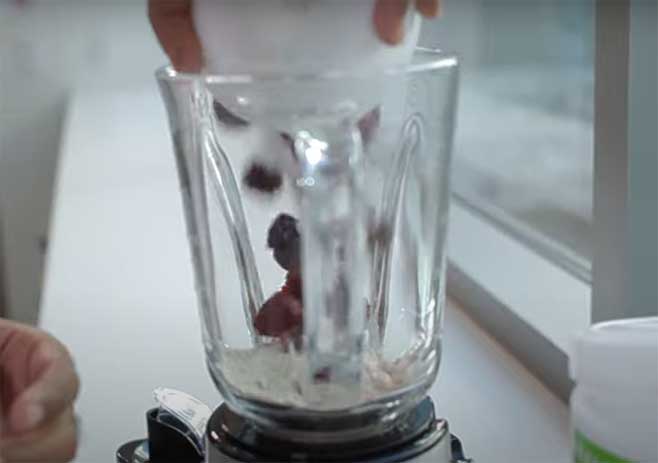 Put Handful Blackberries Into The Blender