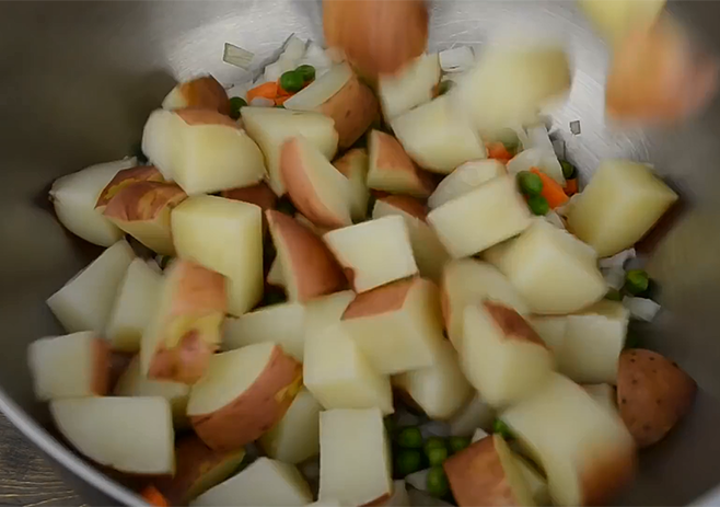 Add the potatoes to vegetables