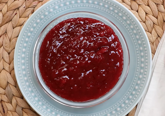 Ready the thick strawberry reduction