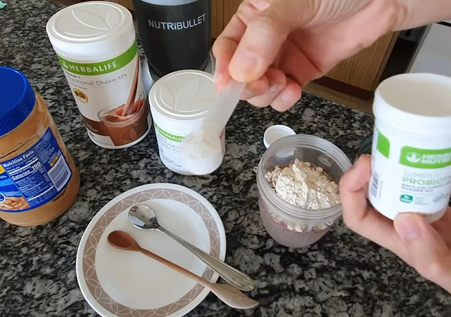 Add Herbalife probiotic powder mix