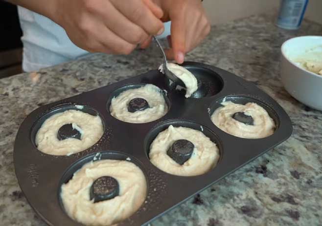 Pour the Batter in the Donut Pan or a Piping Bag