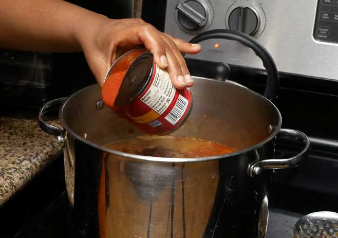Add tomato sauce and sugar