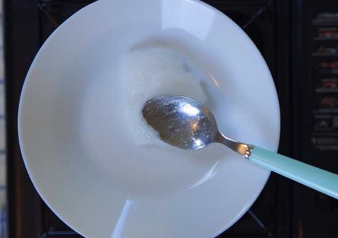 Melt the coconut oil in a bowl