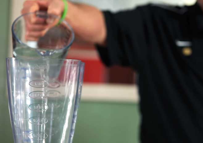  Pour liquids into a blender