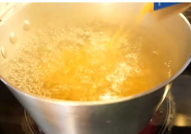 Boil the macaroni noodles