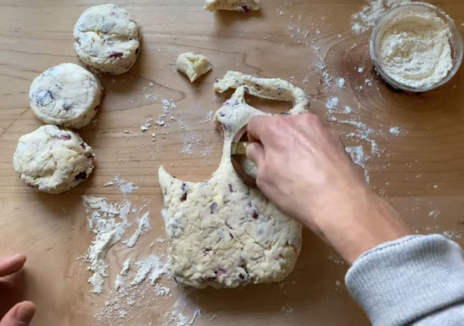 Cut the dough with a biscuit cutter