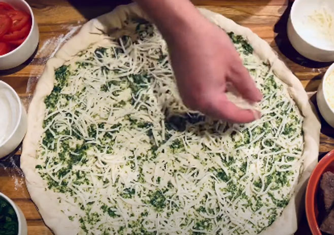  Sprinkle shredded mozzarella cheese on it