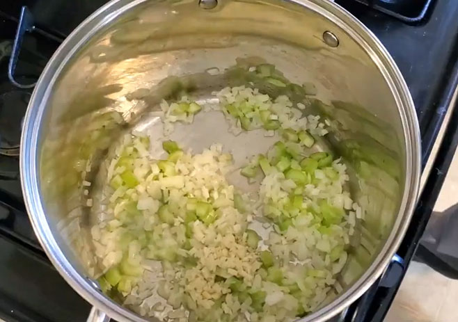 Add onion and garlic with chopped celery