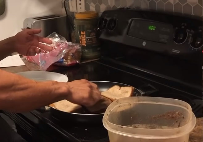 Spread egg white on top of the bread