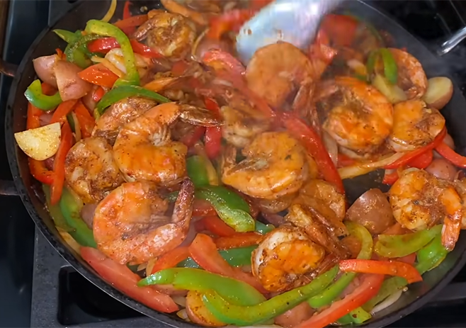 Add shrimp and tomatoes