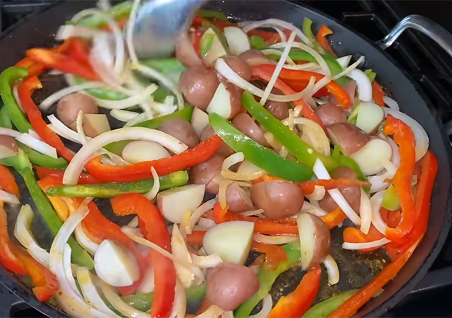 Cook the peppers and onions and potatoes