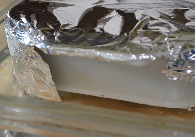 Place the baking pan into a baking dish