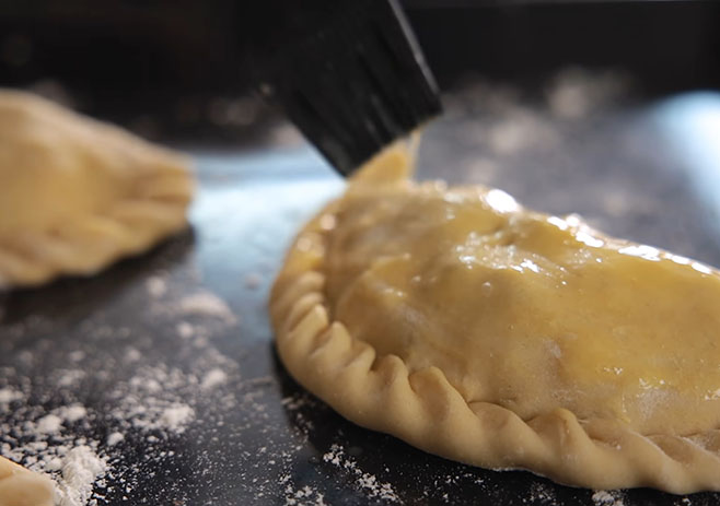 Brush egg wash over the top of the pasties