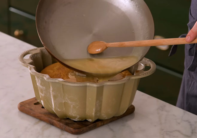 Pour the butter mix over Cake