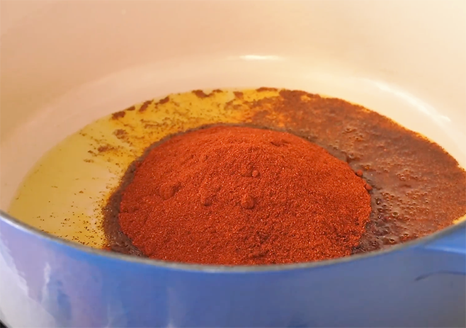 Start cooking the spices