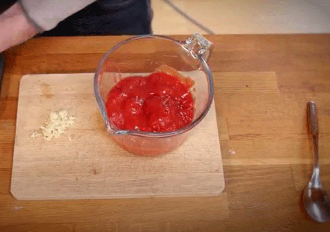 Take Good Quality Tin Tomatoes in a Bowl