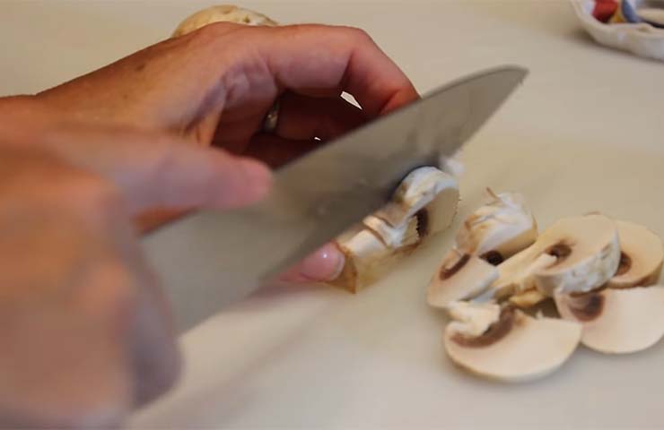 Slicing the mushrooms and meats