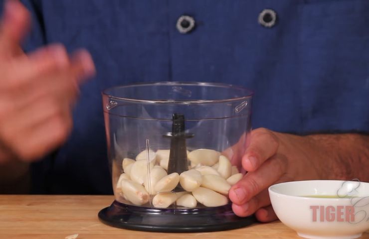 Step One: Start with garlic cloves and chipotles