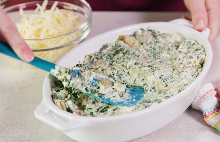 Transfer the mixture to the prepared baking dish