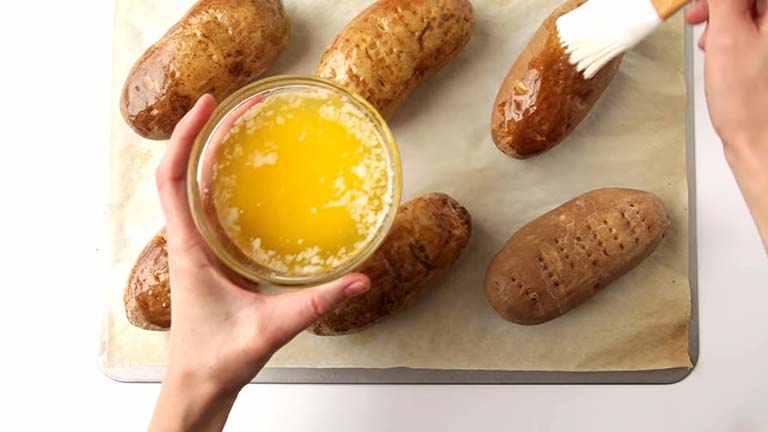 Coating the Potatoes with oil