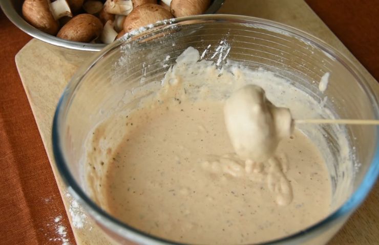 Step 5: Dip the mushrooms in the batter 